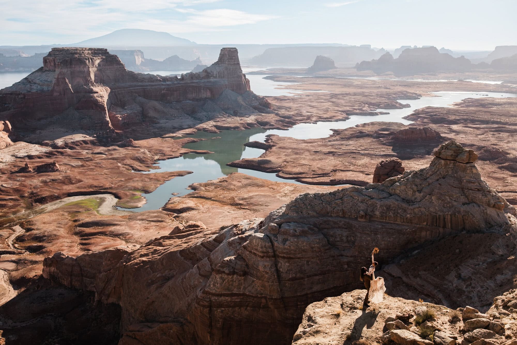 newlyweds overlooking lake powell during their elopement. 