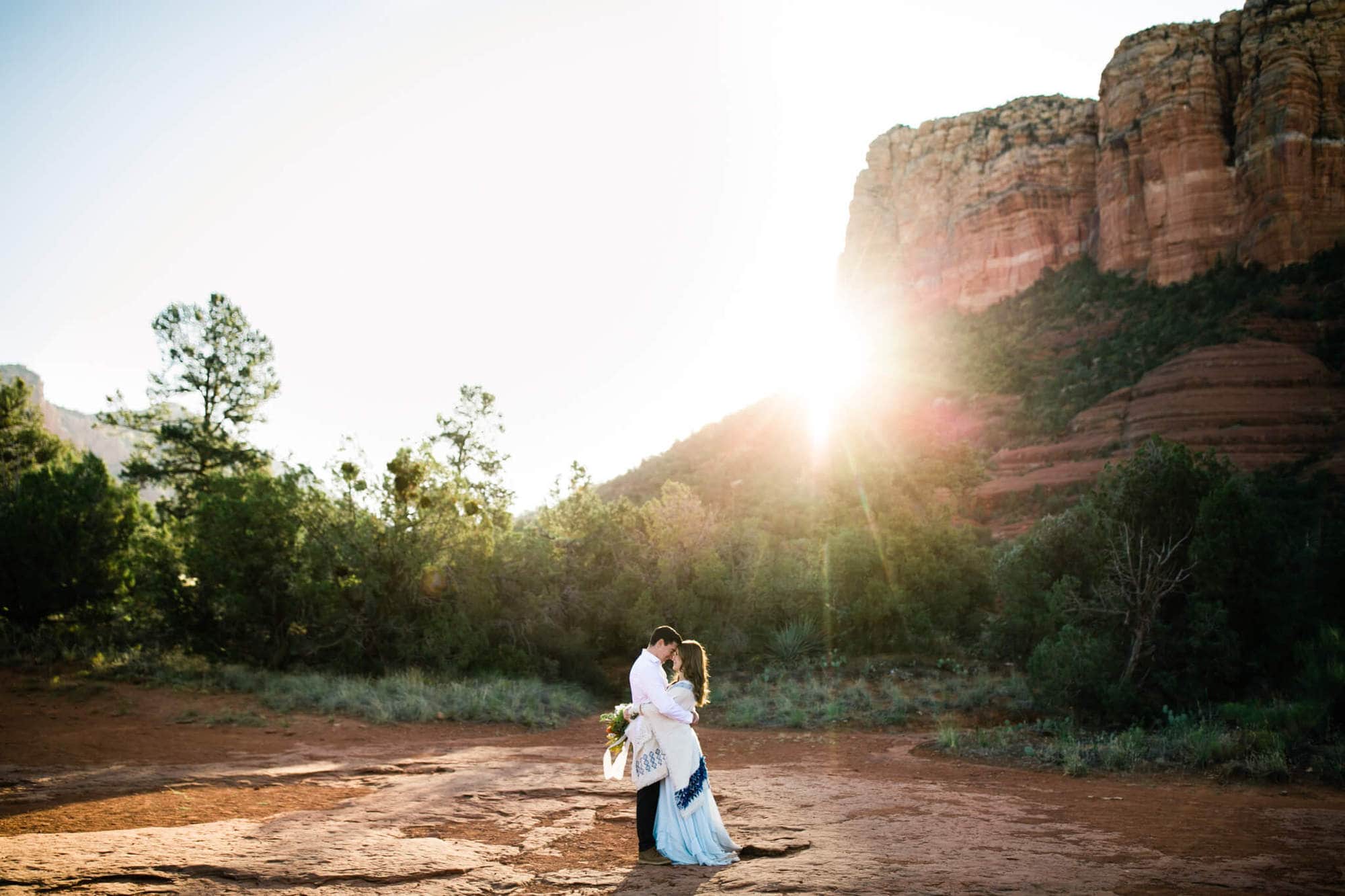 If you're planning a Sedona elopement or love red rocks and the sun, check out this Sedona Adventure Wedding for some major desert elopement inspiration!