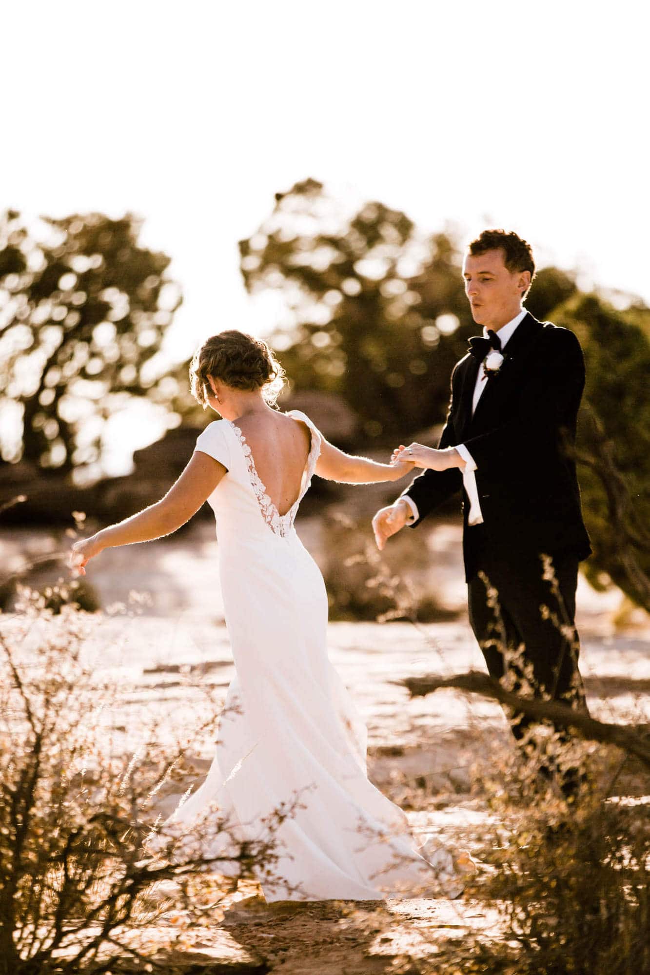 Bride and groom celebrate a first dance during their arches national park elopement. 