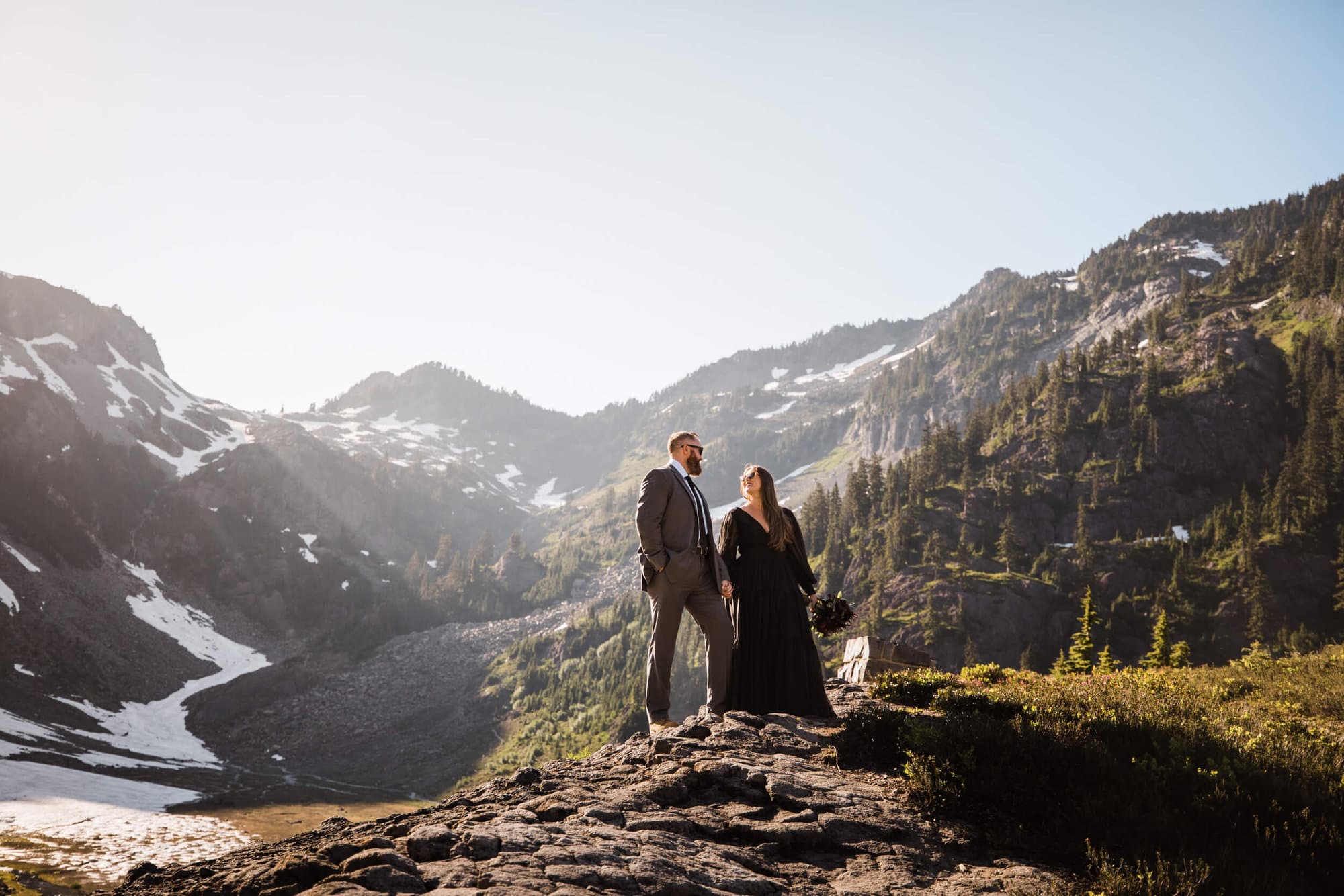 Check out this breathtaking and intimate North Cascades elopement. With a striking black wedding dress set against the snow-capped mountains, this isn't one to miss. 