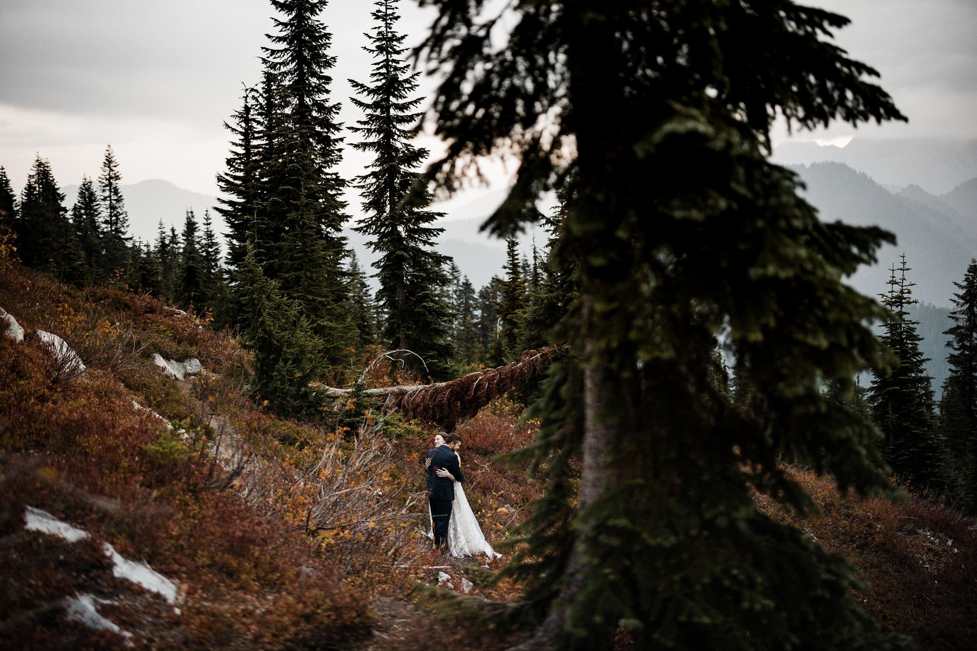 Nothing-not fires, smoke, or rain- would stop this pair of park rangers from getting married. Their Leavenworth hiking elopement really was one for the books.