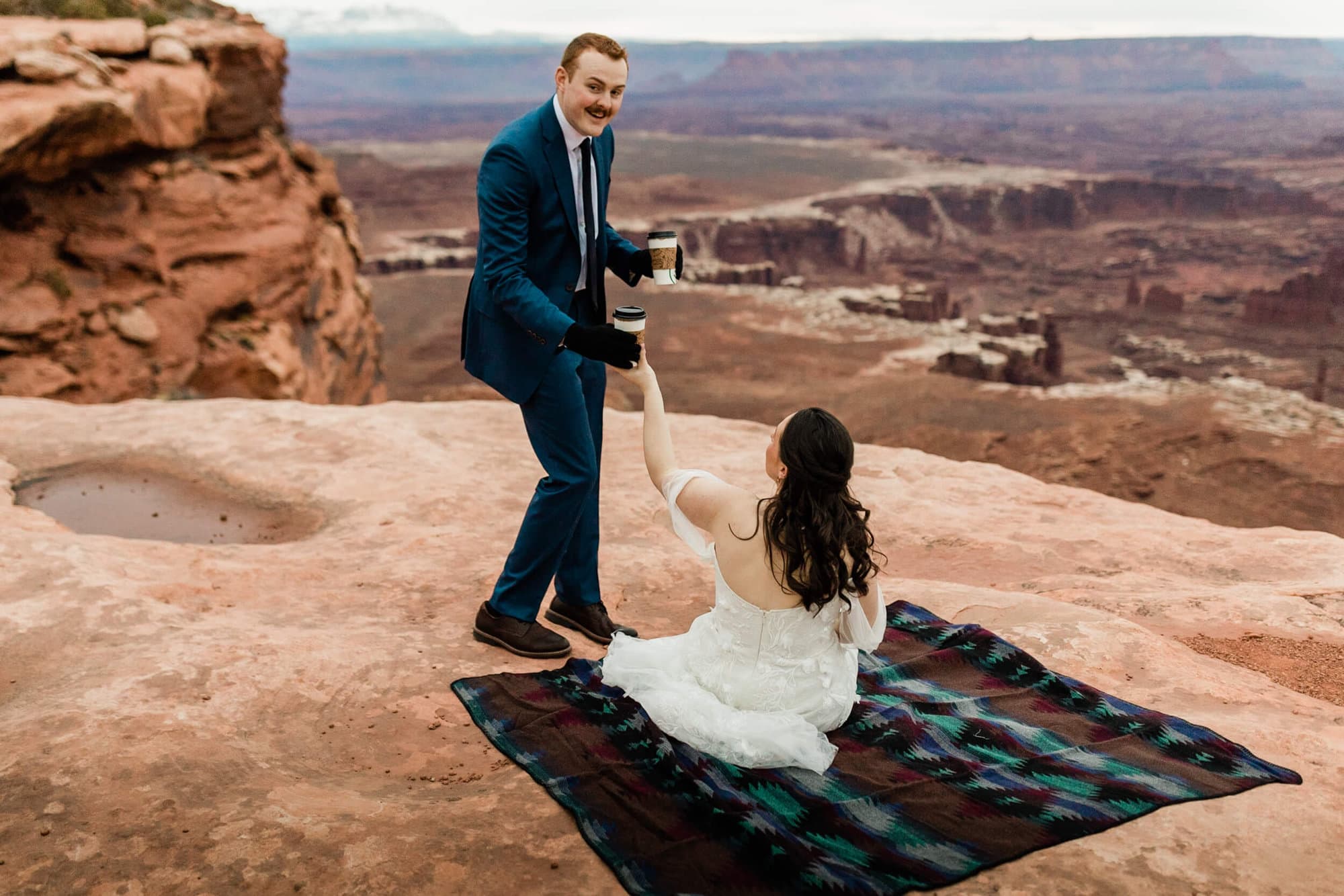 This couple totally embraced the This couple totally embraced nature’s plot twist; weather. This Moab Micro Wedding shows embracing rain can create magic. 