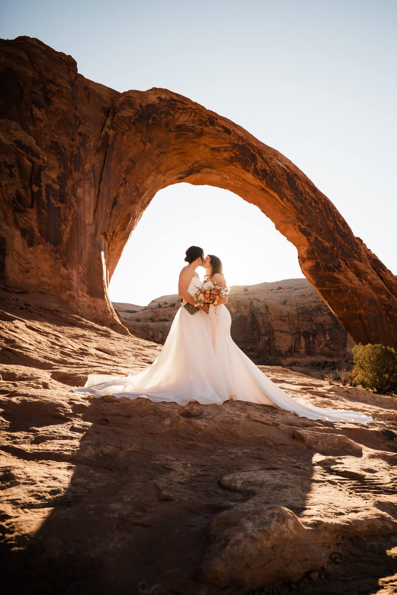 This Moab hiking elopement is the quintessential desert adventure. Hiking, arches, a gorgeous sunset, and so much love and stoke. See it all here.