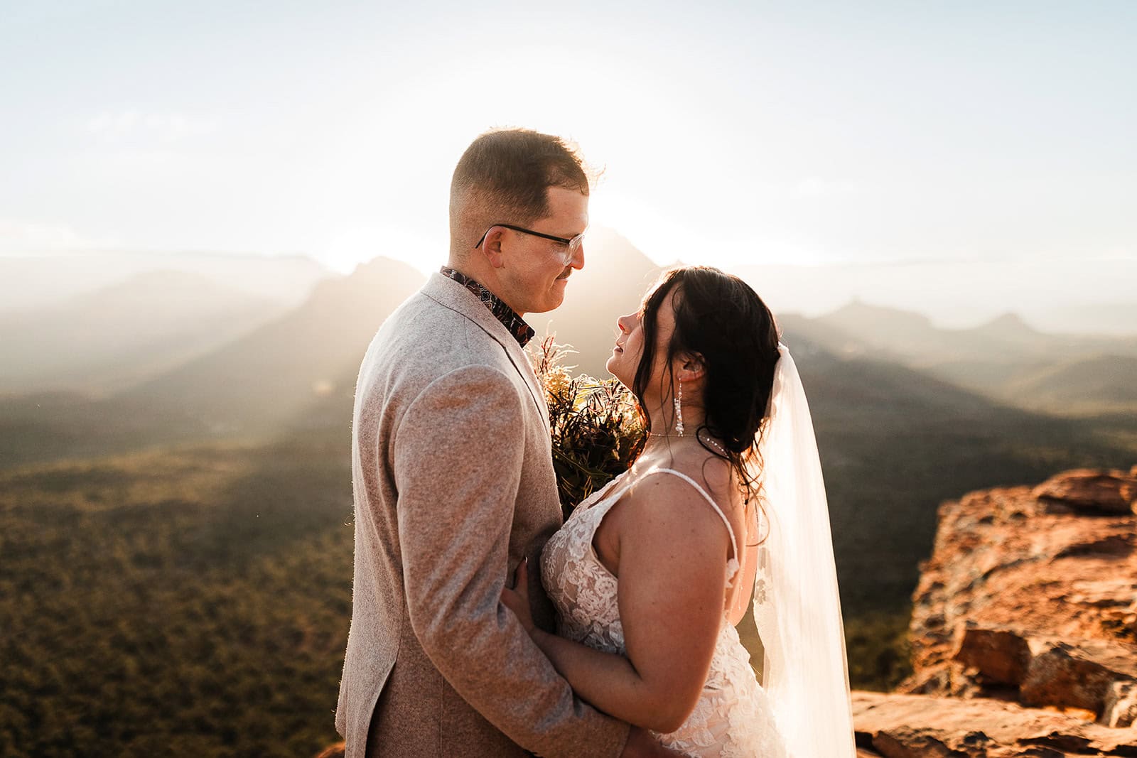 newlyweds hugging in Sedona during their elopement. 
