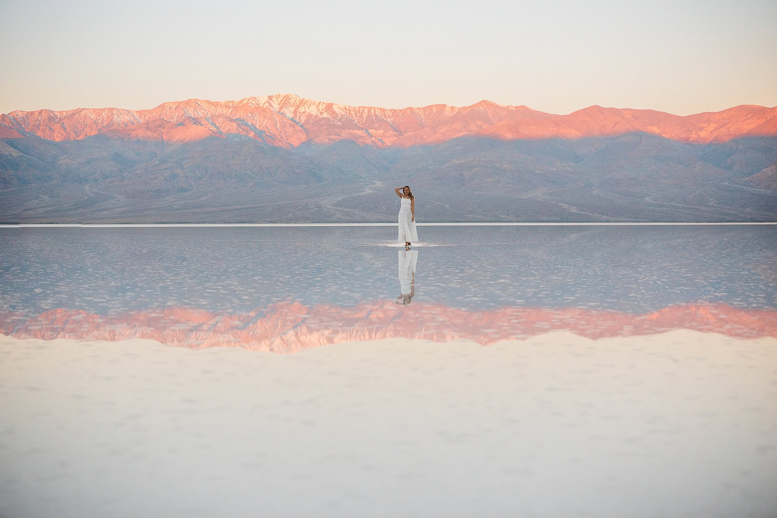 bride walking in lake manly in Death Valley.